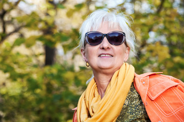 Middle-aged woman in autumnal nature