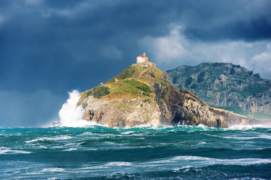 san juan de gaztelugatxe with rough sea