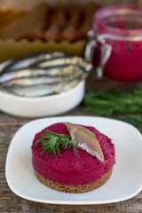 appetizer of beet on a slice of bread
