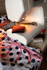 A piece of fabric, pins, scissors and a sewing machine.