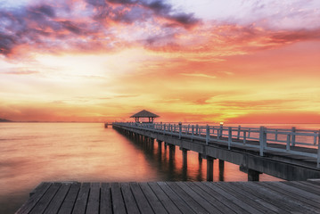 Landscape of Wooded bridge in the port between sunrise