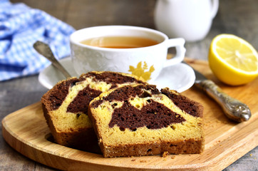 Pumpkin and chocolate cake with cup of tea.