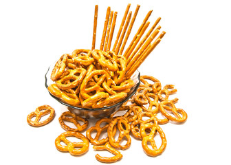 breadsticks and pretzels on a plate closeup