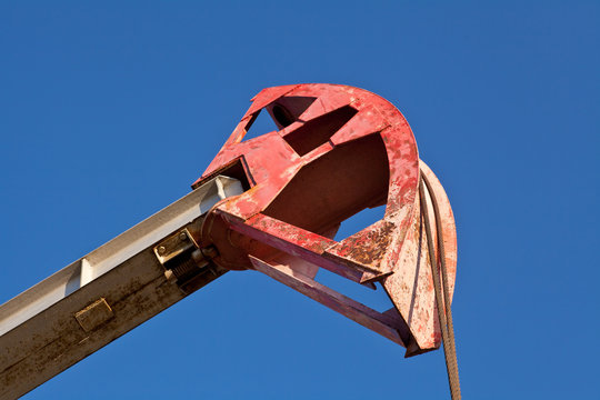part of the oil pump closeup on blue sky background