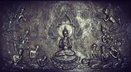 Metal sculpture of buddha story