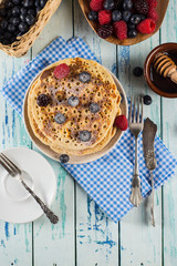 Summer fresh pancakes with fruit breakfast