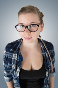 Portrait of young woman in glasses