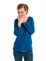 Woman covering her mouth