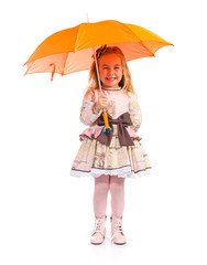 Little girl holding an umbrella