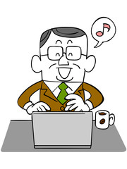 笑顔でノートパソコンを使う年輩のビジネスマン