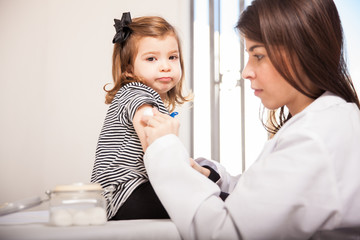 Little girl getting a vaccine