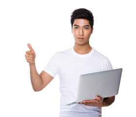 Man use of laptop and thumb up