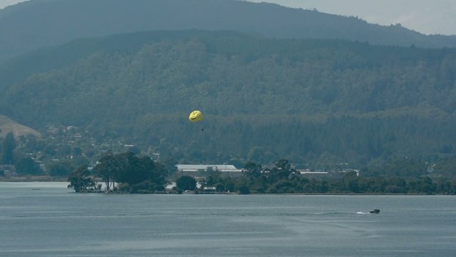 Parasailing over lake Rotorua New Zealand