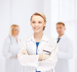 smiling young female doctor in hospital