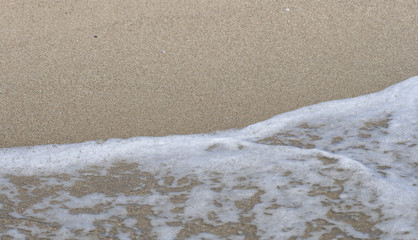 Fototapeta na wymiar sea sandy water edge closeup