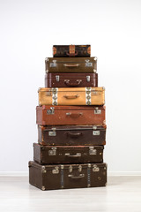 A large number of old suitcases