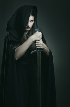Evil expression of beautiful dark woman