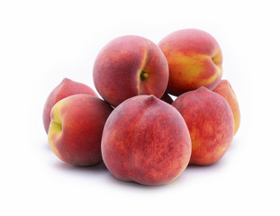 fresh peaches on white background