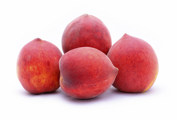 fresh peaches on white background