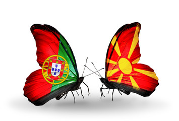 Two butterflies with flags Portugal and Macedonia
