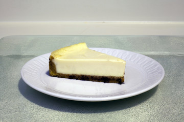Serving of cheesecake