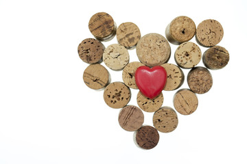 Red heart with wine corks form a heart shape