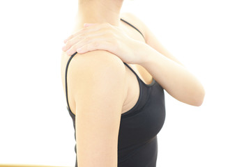 肩痛を訴える女性