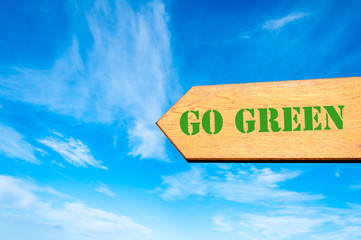 Arrow sign with Go Green message