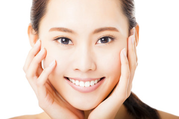 closeup smiling young  woman face isolated on white