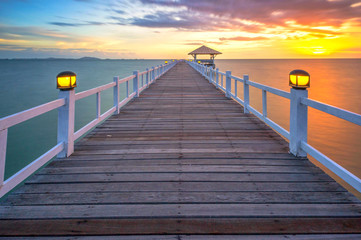 Wooden bridge with the sunset light