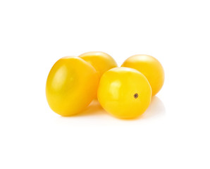 Yellow tomatoes on white background