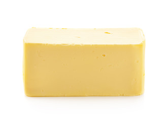 Stick of butter isolated on white background
