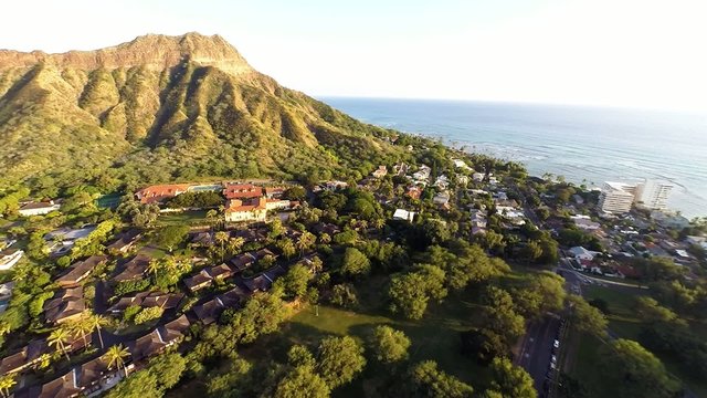 Aerial over Kapiolani Park towards Diamond Head in Honolulu, HI