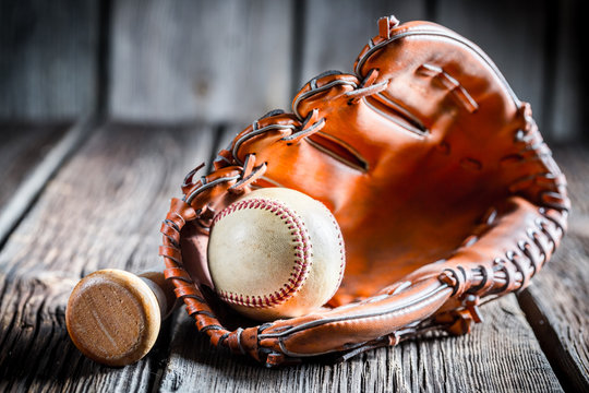 Worn Baseball ball and glove