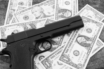 Close up money with Gun.