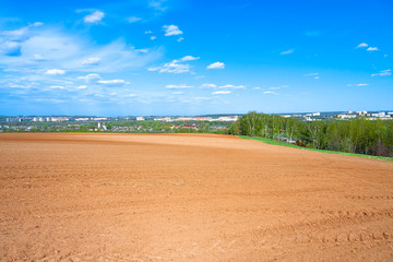 Fototapeta na wymiar agricultural arable land field in the spring for crops