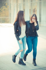 two young beautiful women friends