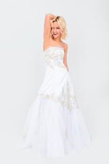 Fototapeta na wymiar slim and beautiful model in a dress of the bride