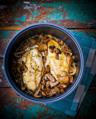 stewed chicken breast with mushrooms in the crock-pot.