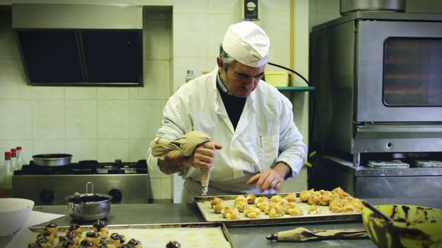 baker preparing cream puff