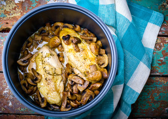 stewed chicken breast with mushrooms in the crock-pot.