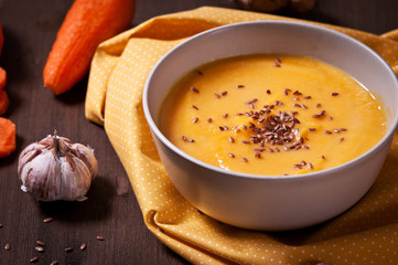 Carrot soup won wooden backgraund