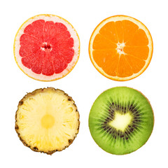 Slices of grapefruit, orange, pineapple and kiwi