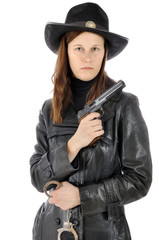 Fototapeta premium Frau in Sheriff Kostüm mit Pistole und Handschellen