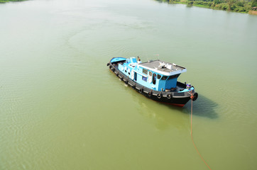 Fototapeta na wymiar Barge and Tug Boat cargo ship in Choaphraya river