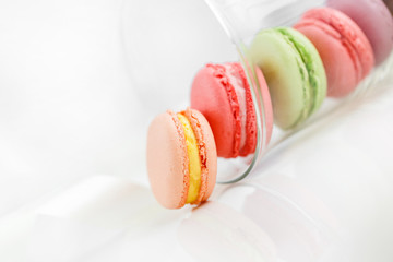 Colorful French pastry on a white background.