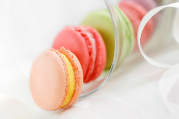 Colorful French pastry on a white background.