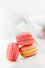 Colorful French pastry on a white background.