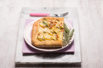 focaccia with sliced potatoes and rosemary