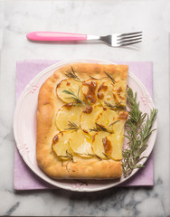 focaccia with sliced potatoes and rosemary